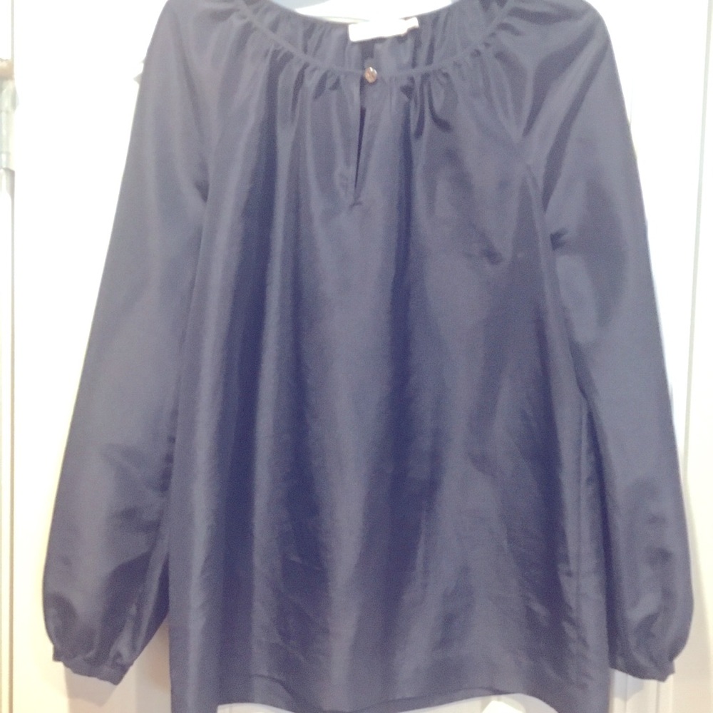 Tory Burch blouse can be worn with anything.